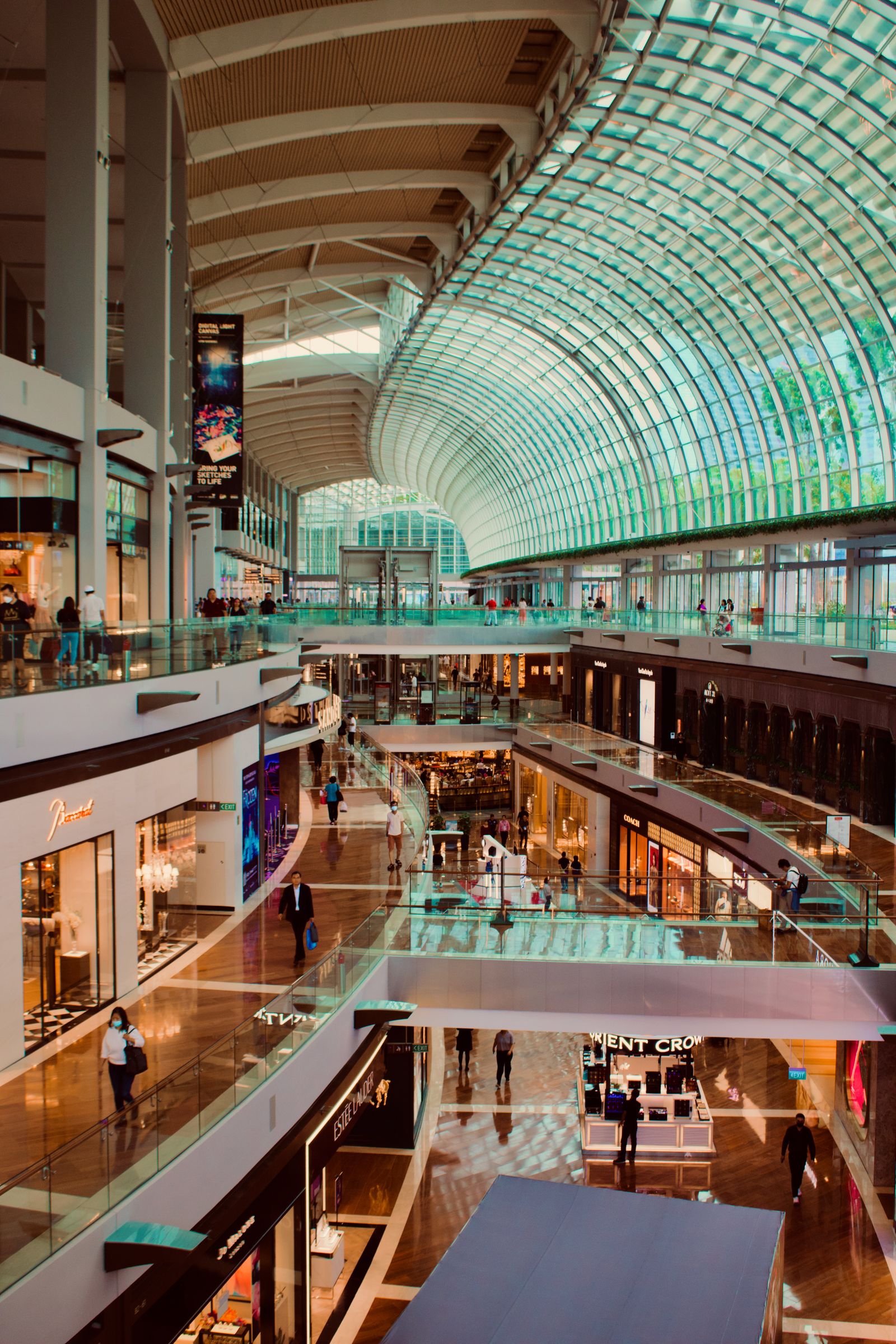 Brand stores and shoppers at The Shoppes at Marina Bay Sands, Singapore